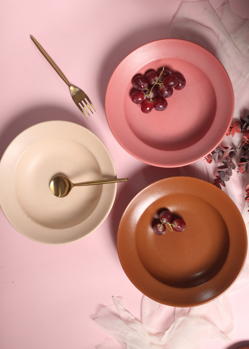 handmade pasta plates with golden cutlery