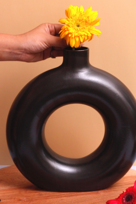 Handmade flower vase with flowers
