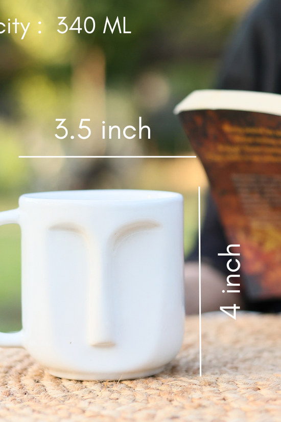 Face designed coffee mug height & breadth