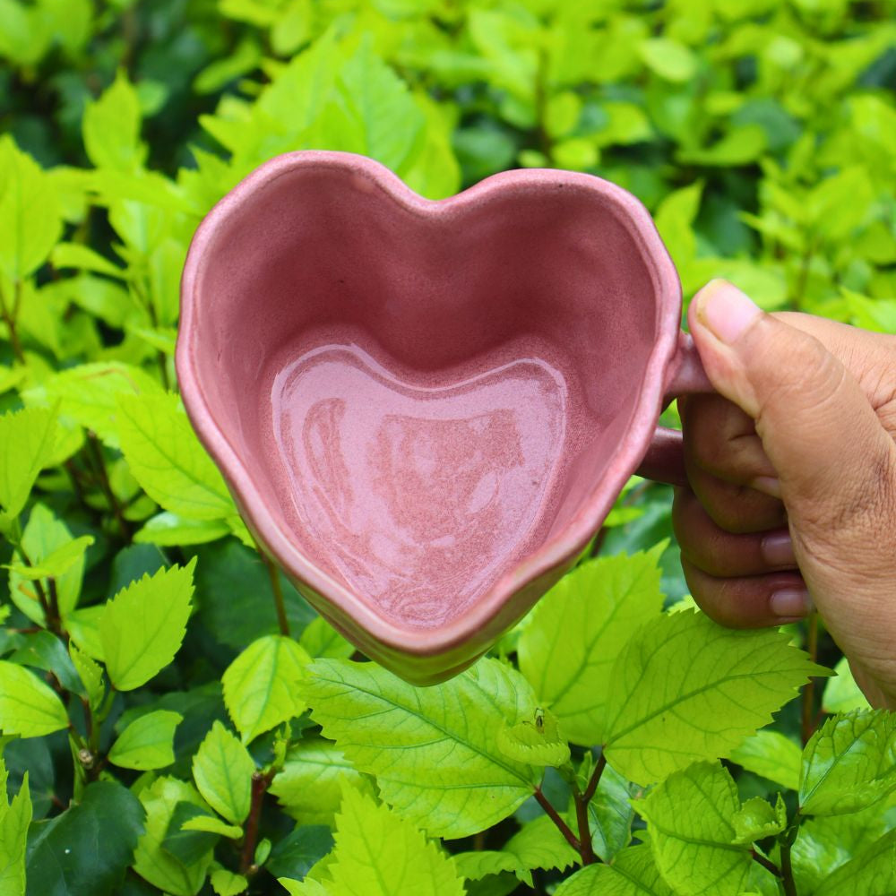 dusty pink heart shaped mug made by ceramic