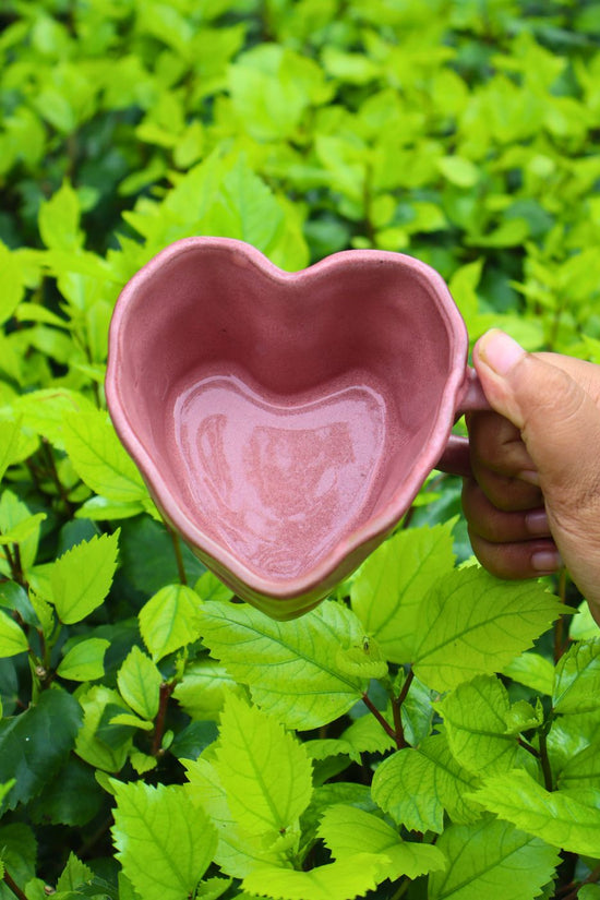 dusty pink heart shaped mug made by ceramic