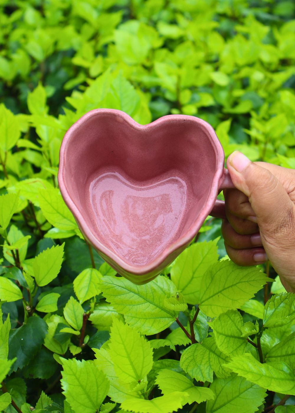 dusty pink heart shaped mug made by ceramic