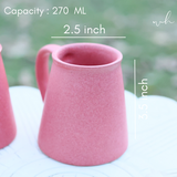 Pink ceramic coffee mug height & breadth