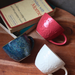set of three textured mug made by ceramic 