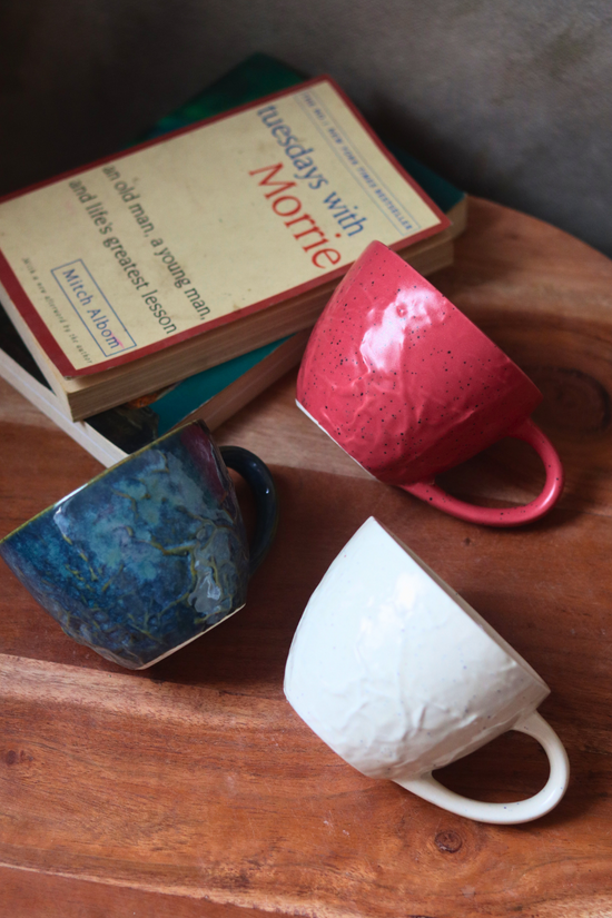 set of three textured mug made by ceramic 
