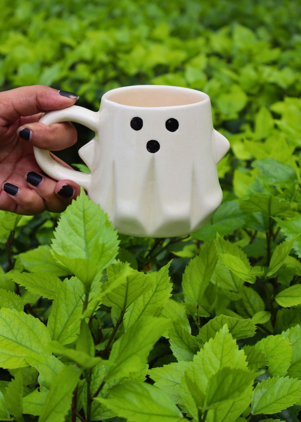 spooky ghost mug made by ceramic