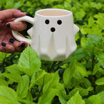 spooky ghost mug made by ceramic