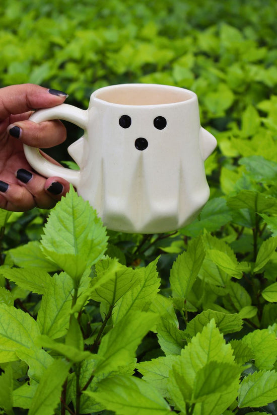 spooky ghost mug made by ceramic