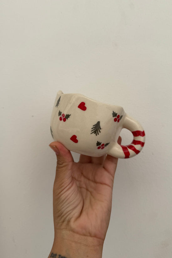 Holly Jolly Mug made by ceramic