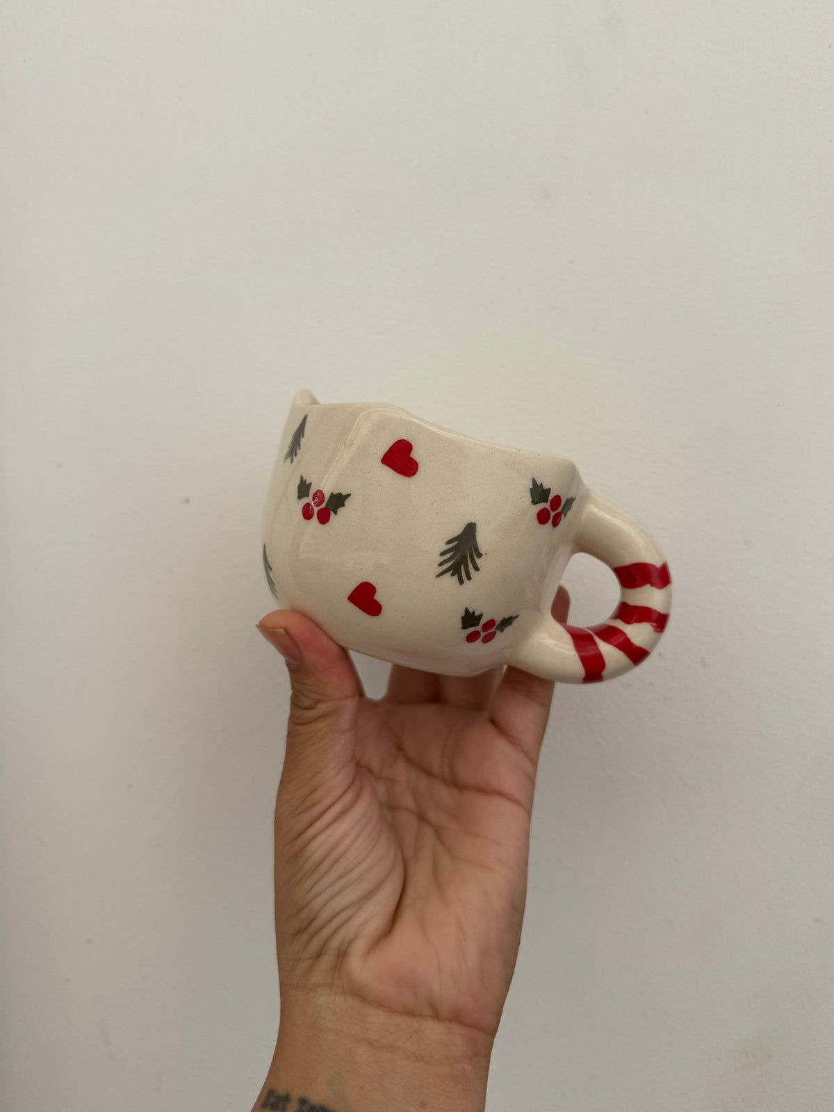 Holly Jolly Mug made by ceramic