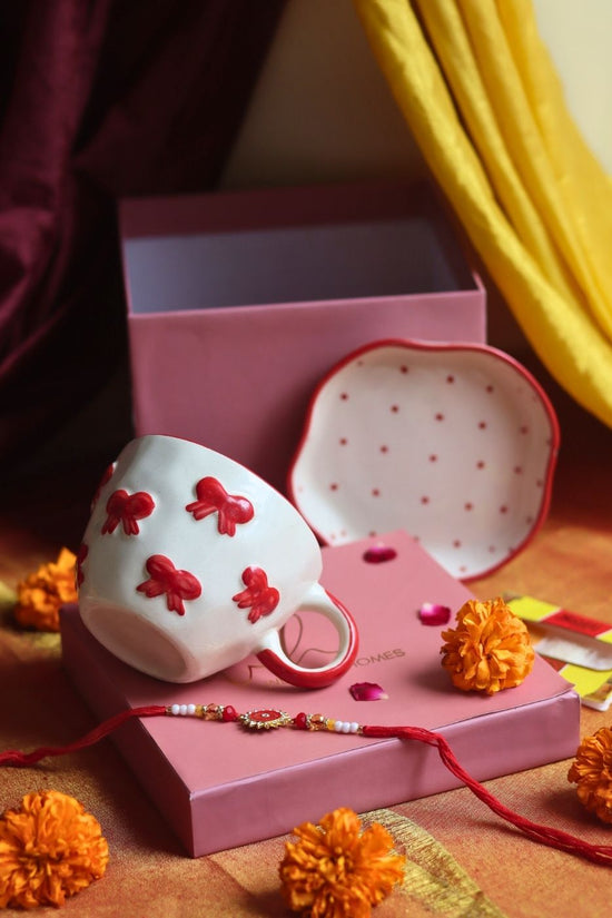 Bow Mug & Red Polka Dessert Plate Rakhi Gift Box with premium quality material