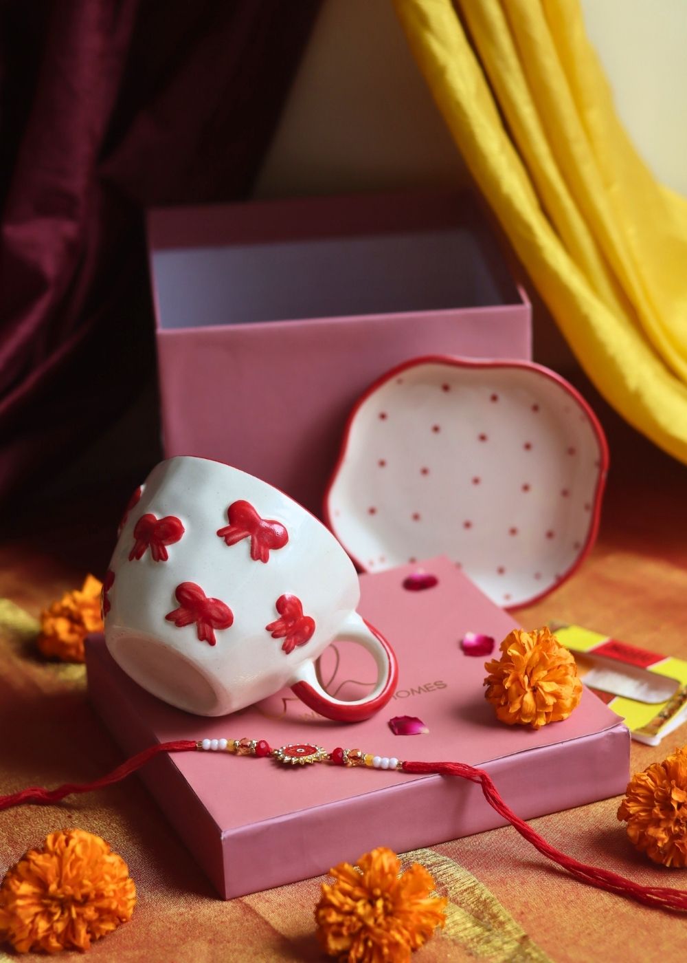 Bow Mug & Red Polka Dessert Plate Rakhi Gift Box with premium quality material