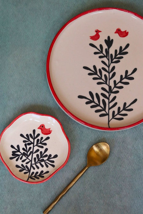 set of two birdie plates 