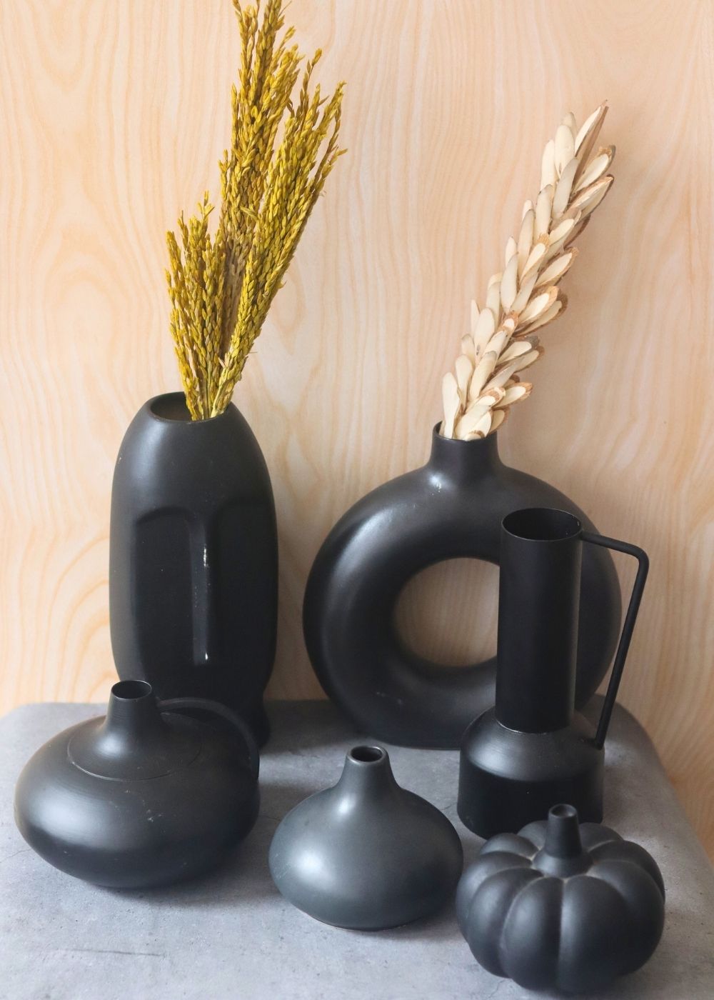 black vases made by ceramic 