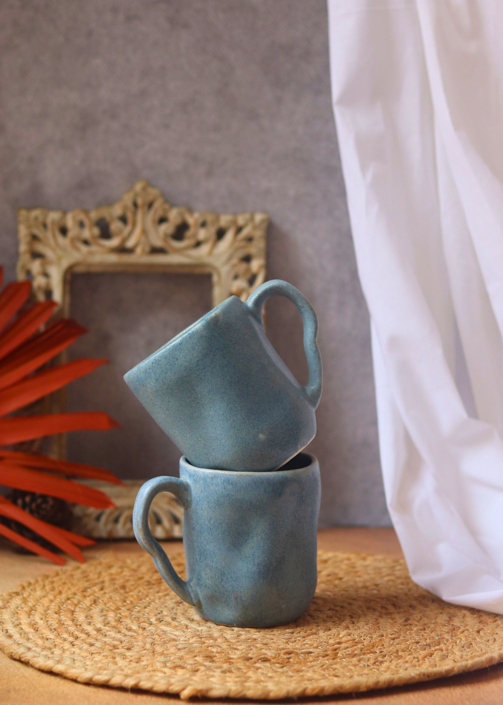 Ceramic coffee mugs on each other