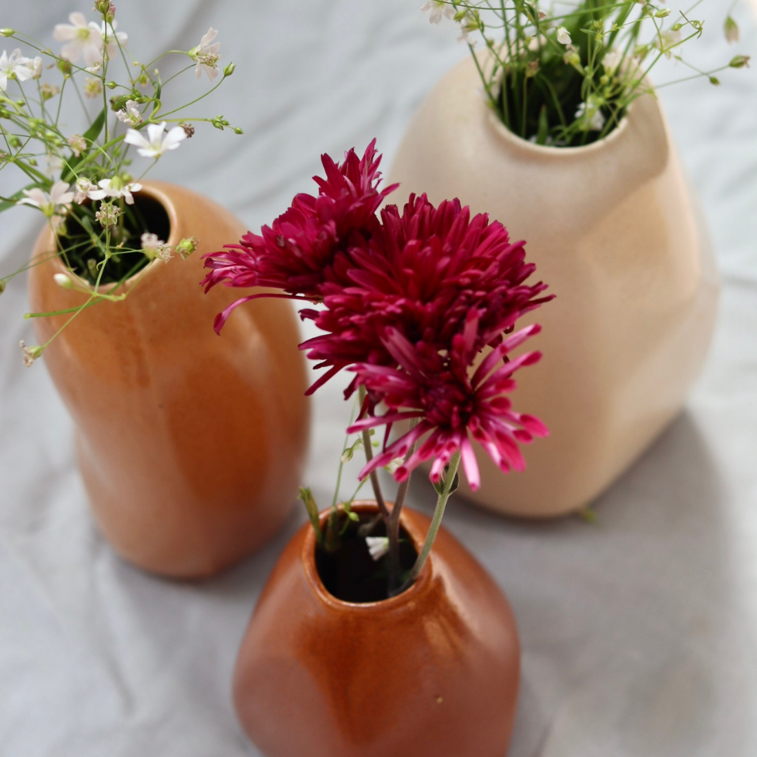 Ceramic flower pots with flowers