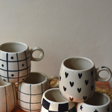 cuddle mugs with black & white color