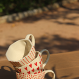 set of three red mugs made by premium quality ceramic 