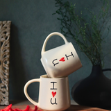 Two handmade ceramic i heart you mugs 