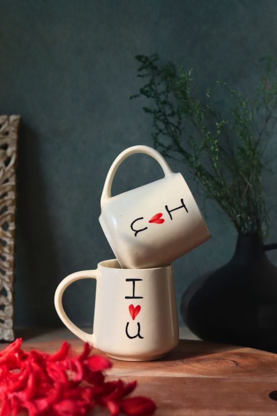 Two handmade ceramic i heart you mugs 