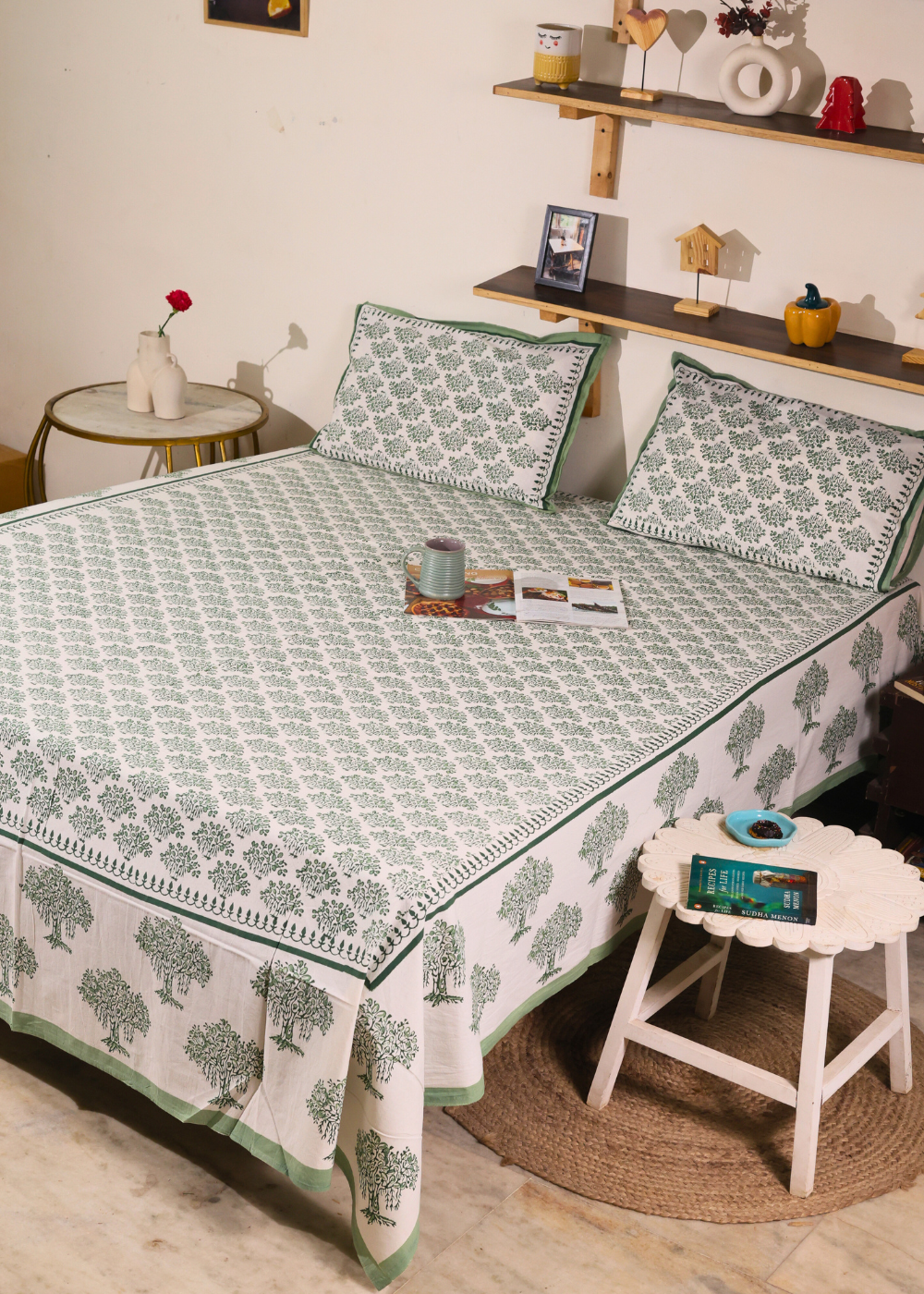 A systematic room with block printed bedsheet on bed