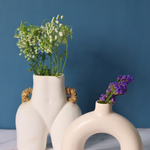 set of two white vase made by ceramic 