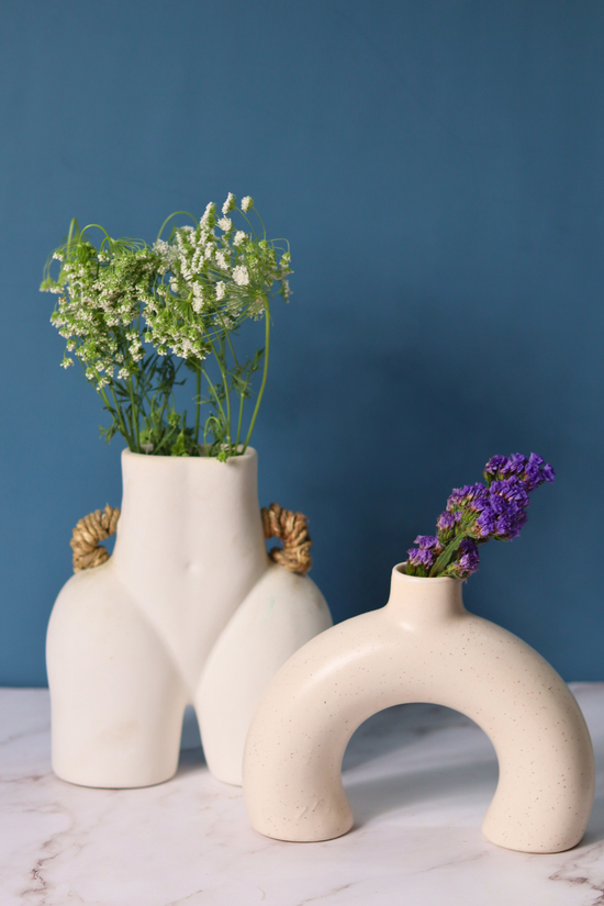 set of two white vase made by ceramic 