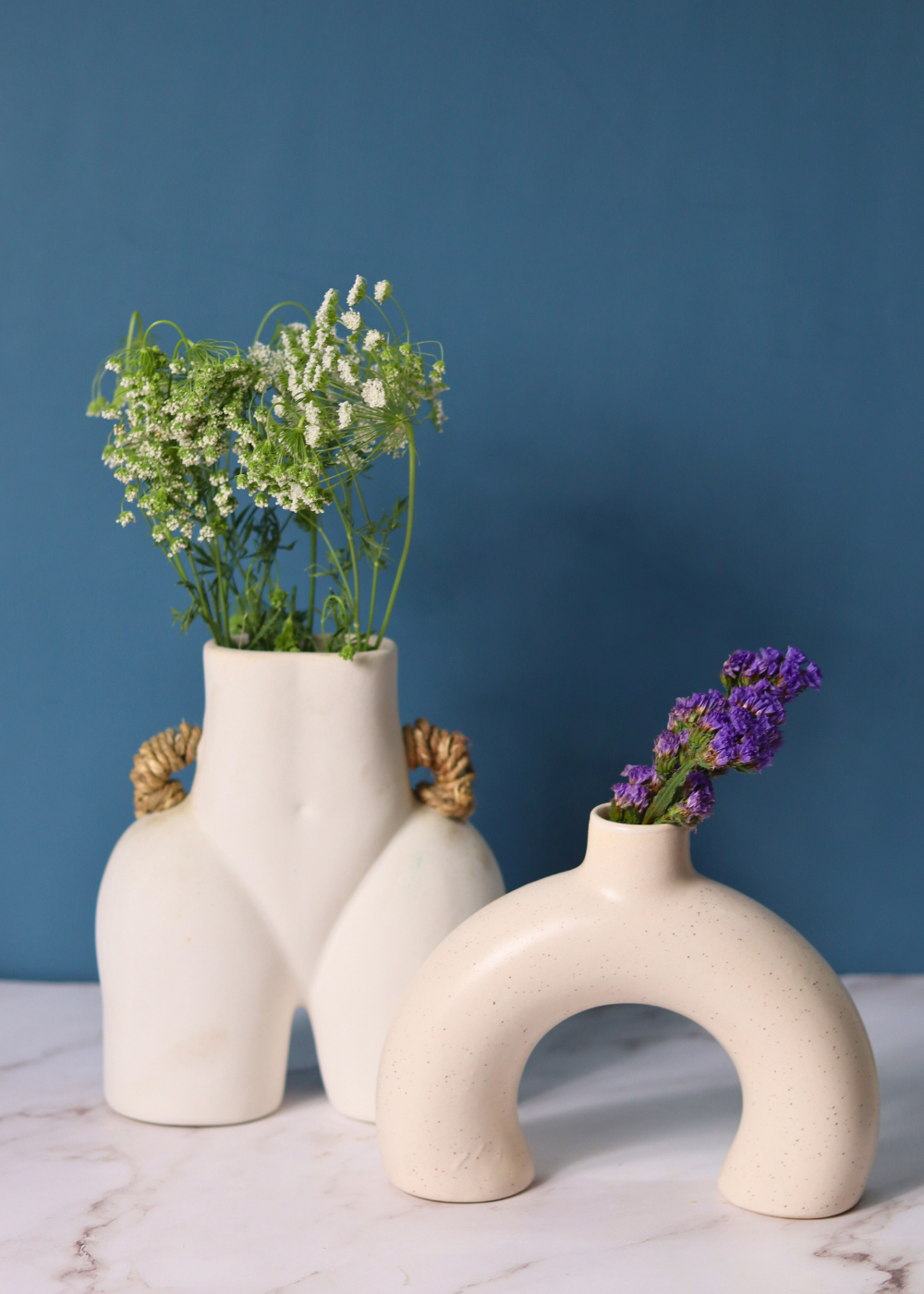 set of two white vase made by ceramic 