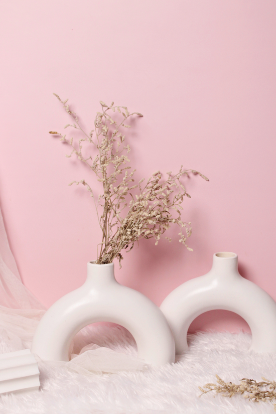 white half donut vase made by ceramic 