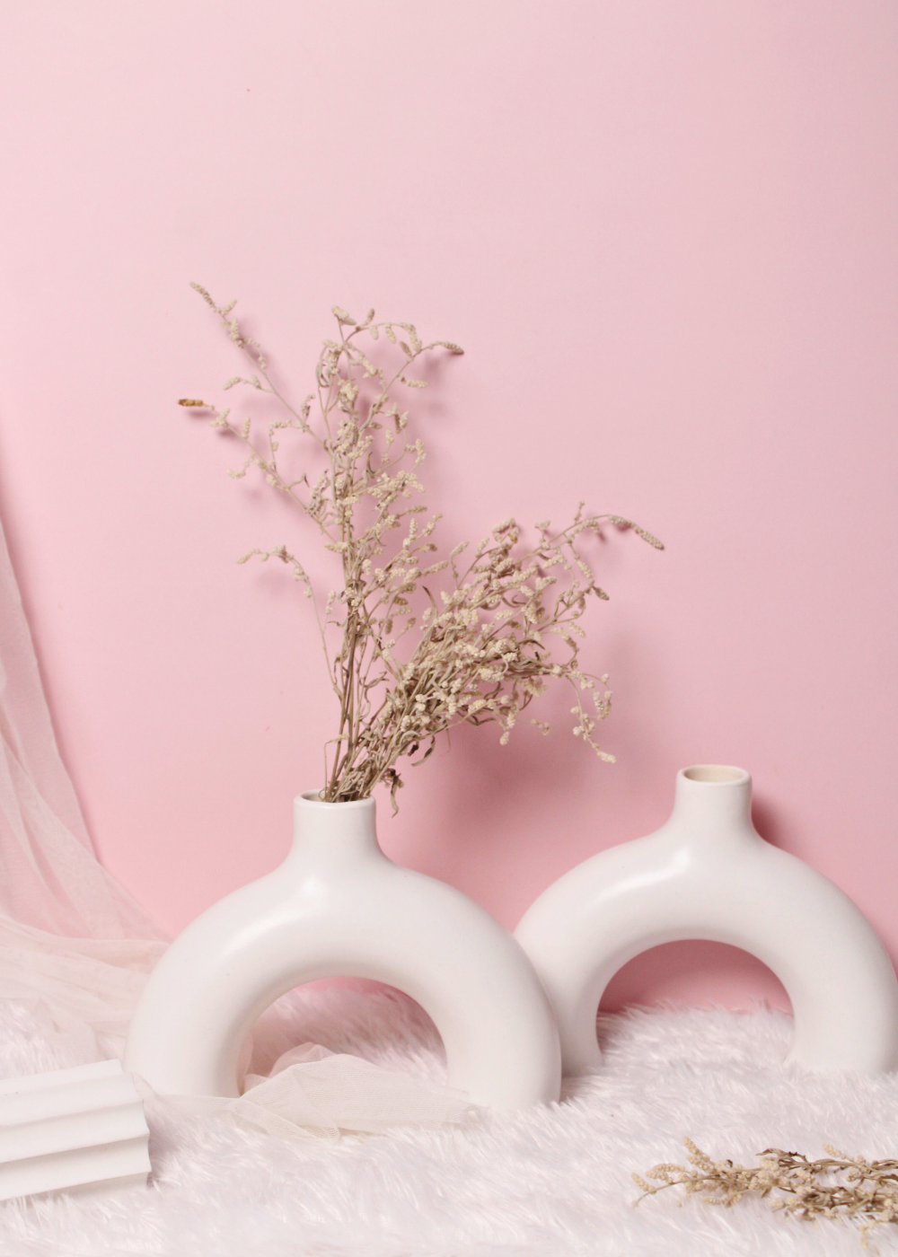 white half donut vase made by ceramic 