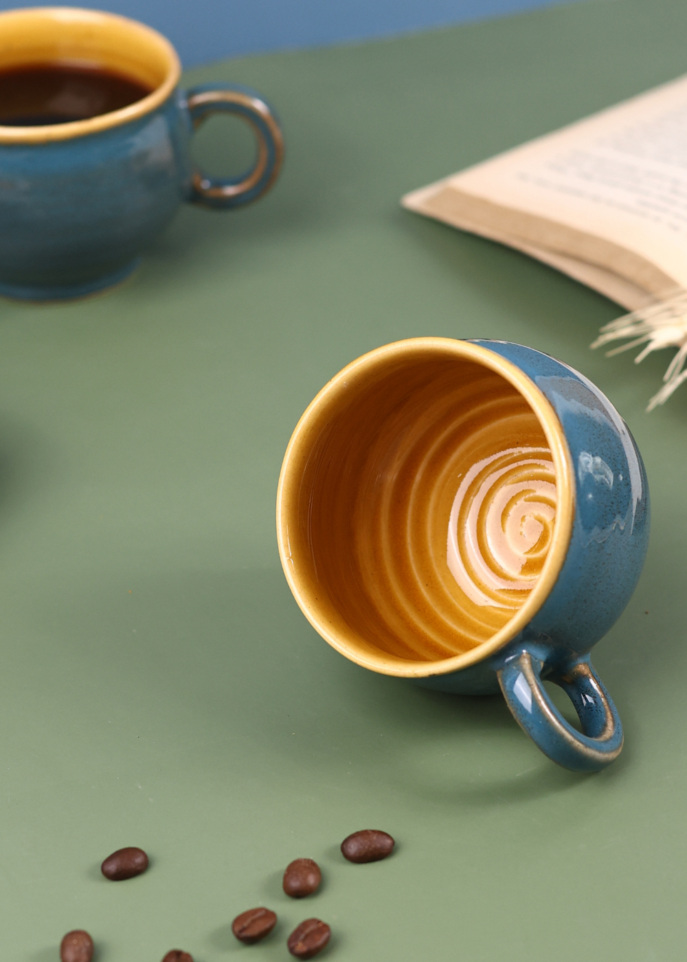 Coffee mugs with coffee beans 