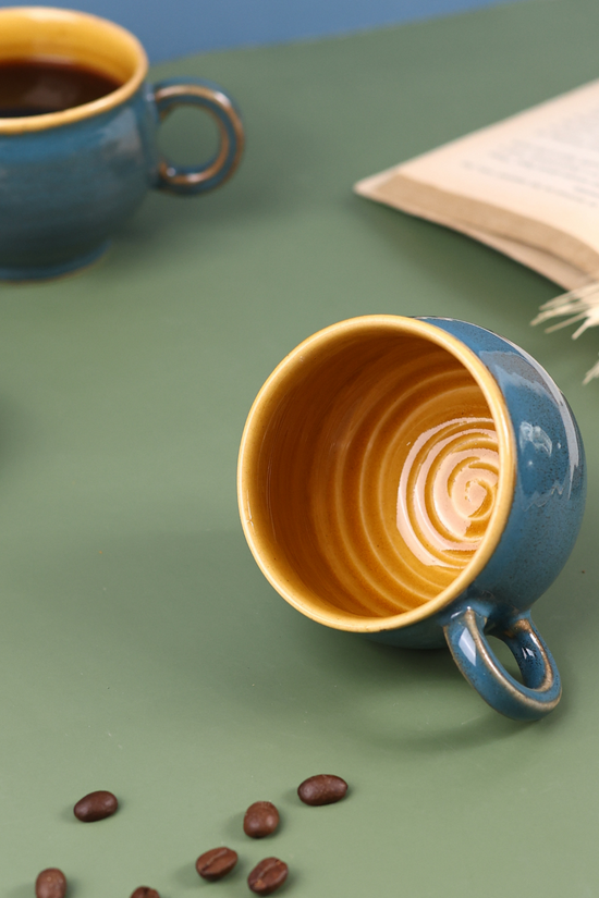 Coffee mugs with coffee beans 