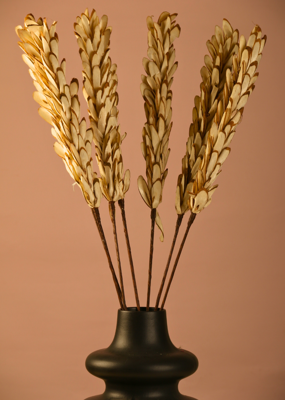 Dried almond leaf bouquet with vase