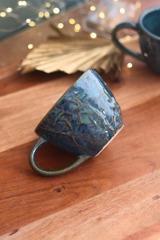 blue textured mug made by ceramic 
