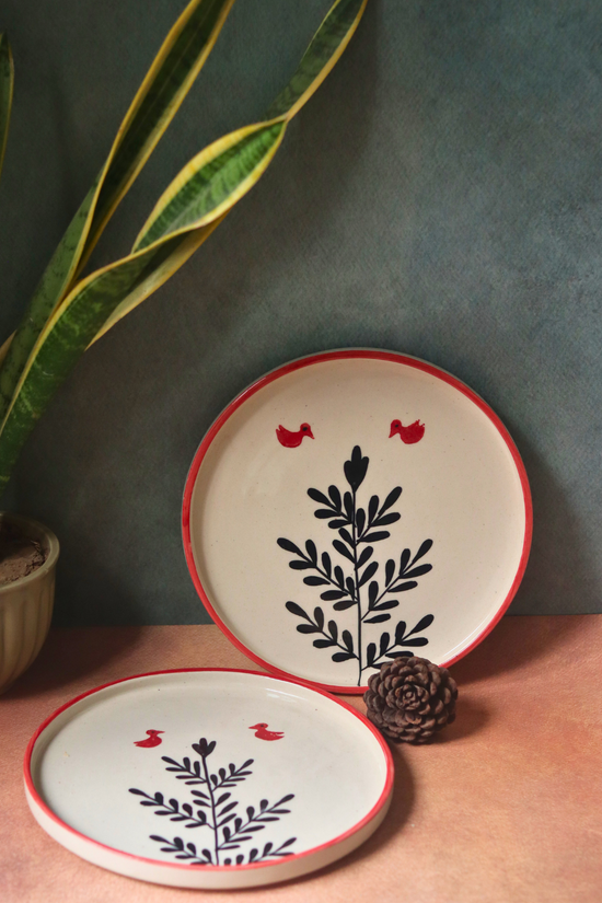 Birdie platter one is standing one is on the surface