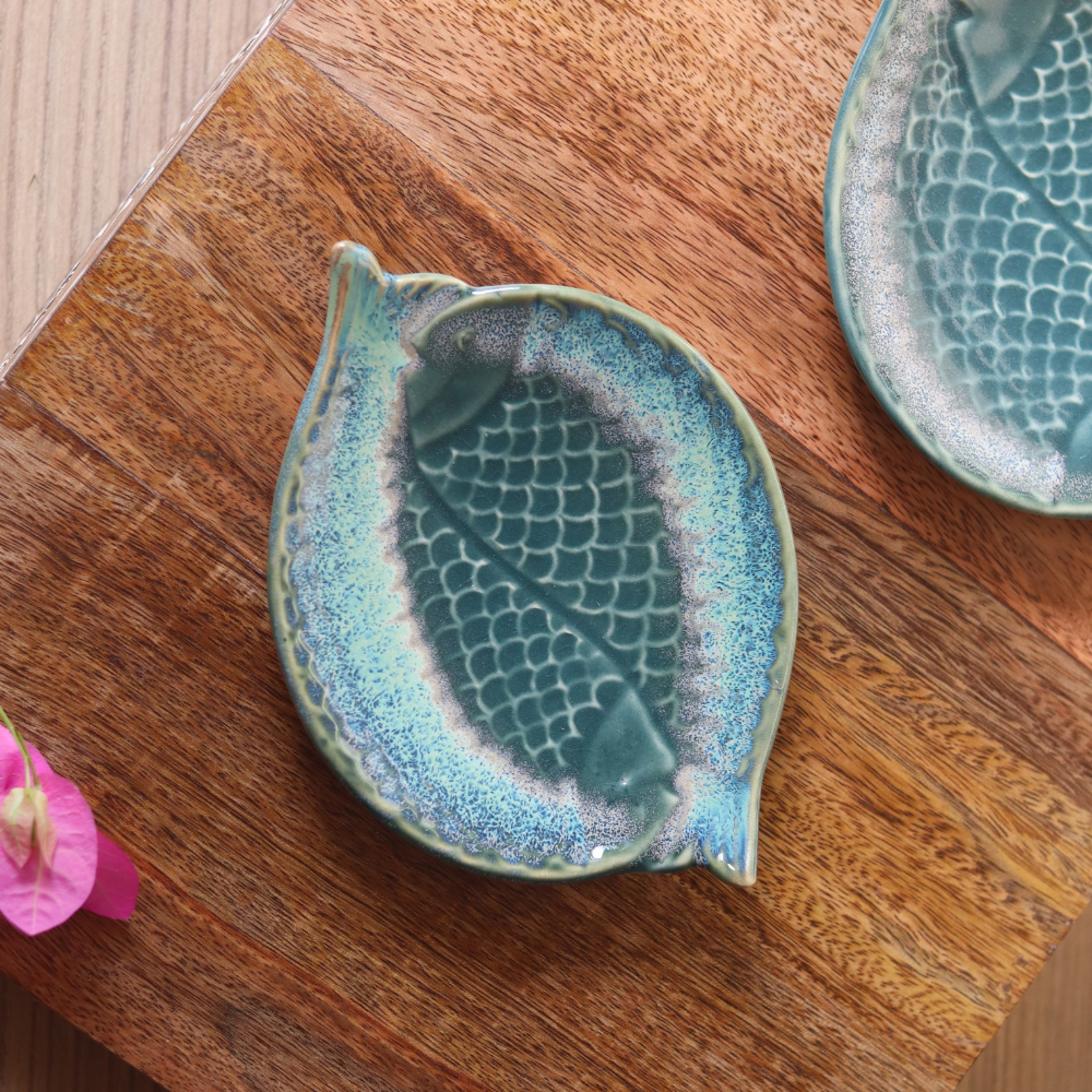 Dual fish platter on wooden surface