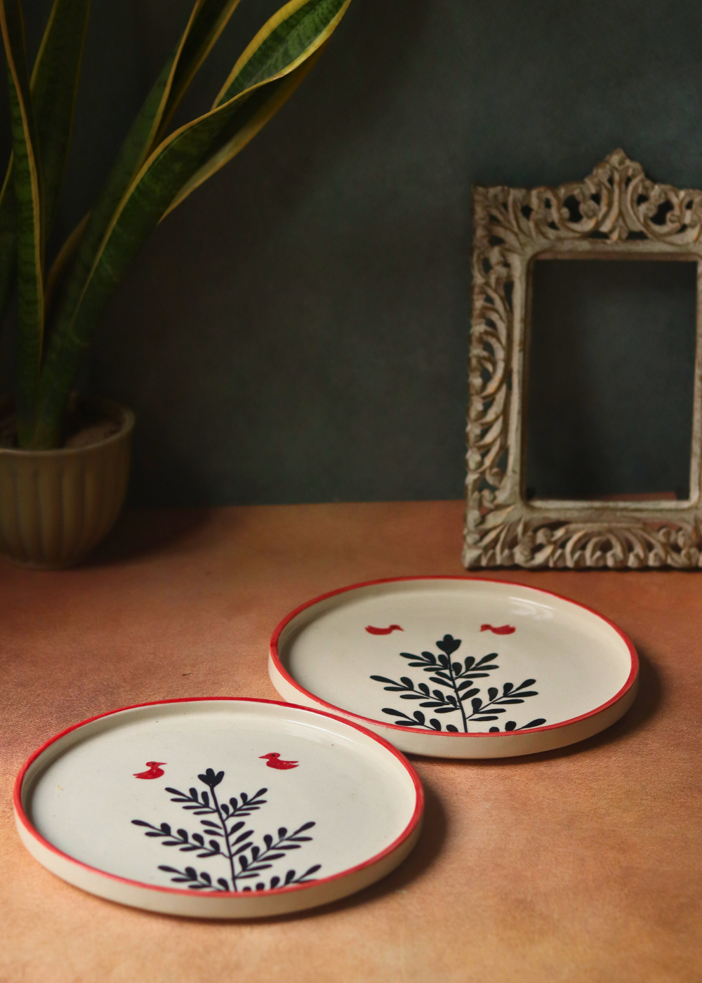 Two handmade ceramic birdie platters 