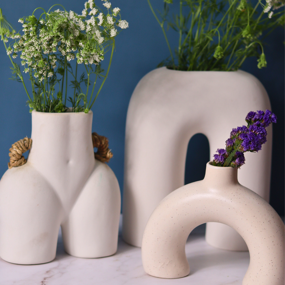 set of three white vase made by ceramic 