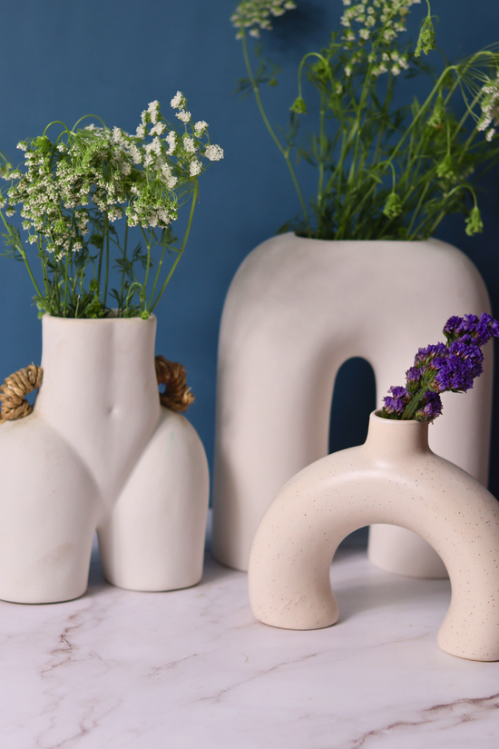 set of three white vase made by ceramic 