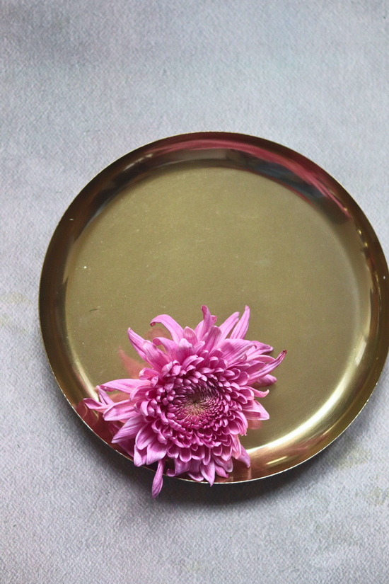 Dinnerware brass plate with flower