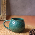 Ceramic coffee mug green color