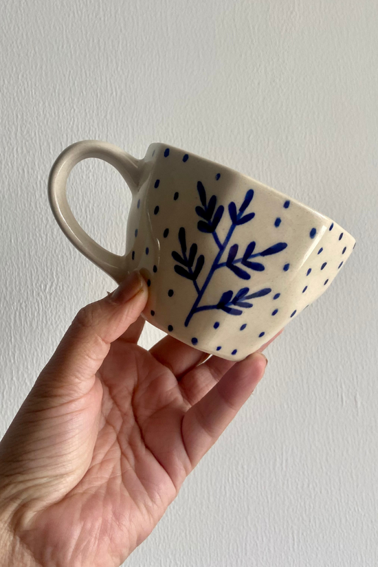 handmade blue leaf mug made by ceramic 