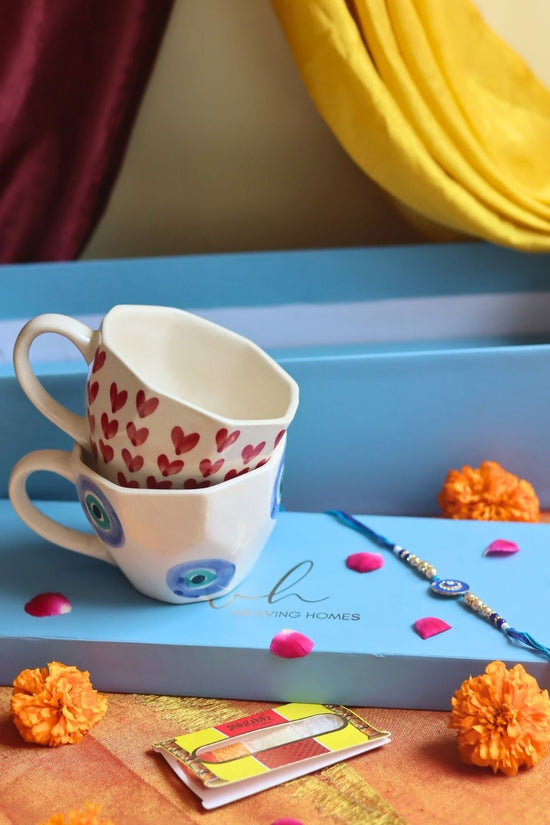 Heart & Evil Eye Mug Set Rakhi Gift Box made by ceramic