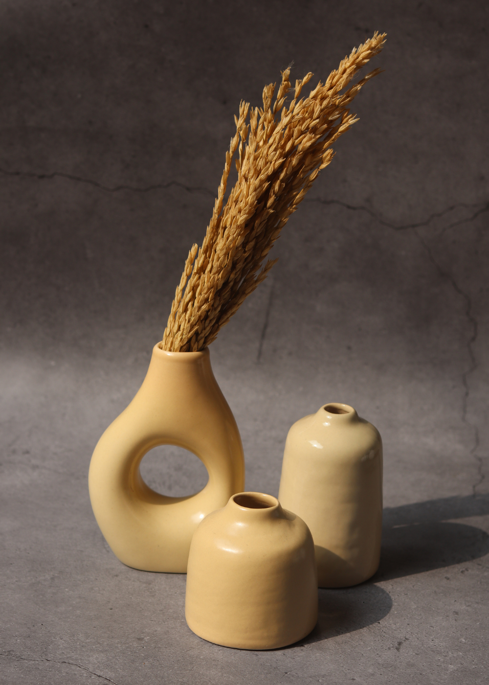 set of three vases with cream color