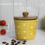 Handmade ceramic yellow polka jar height & breadth