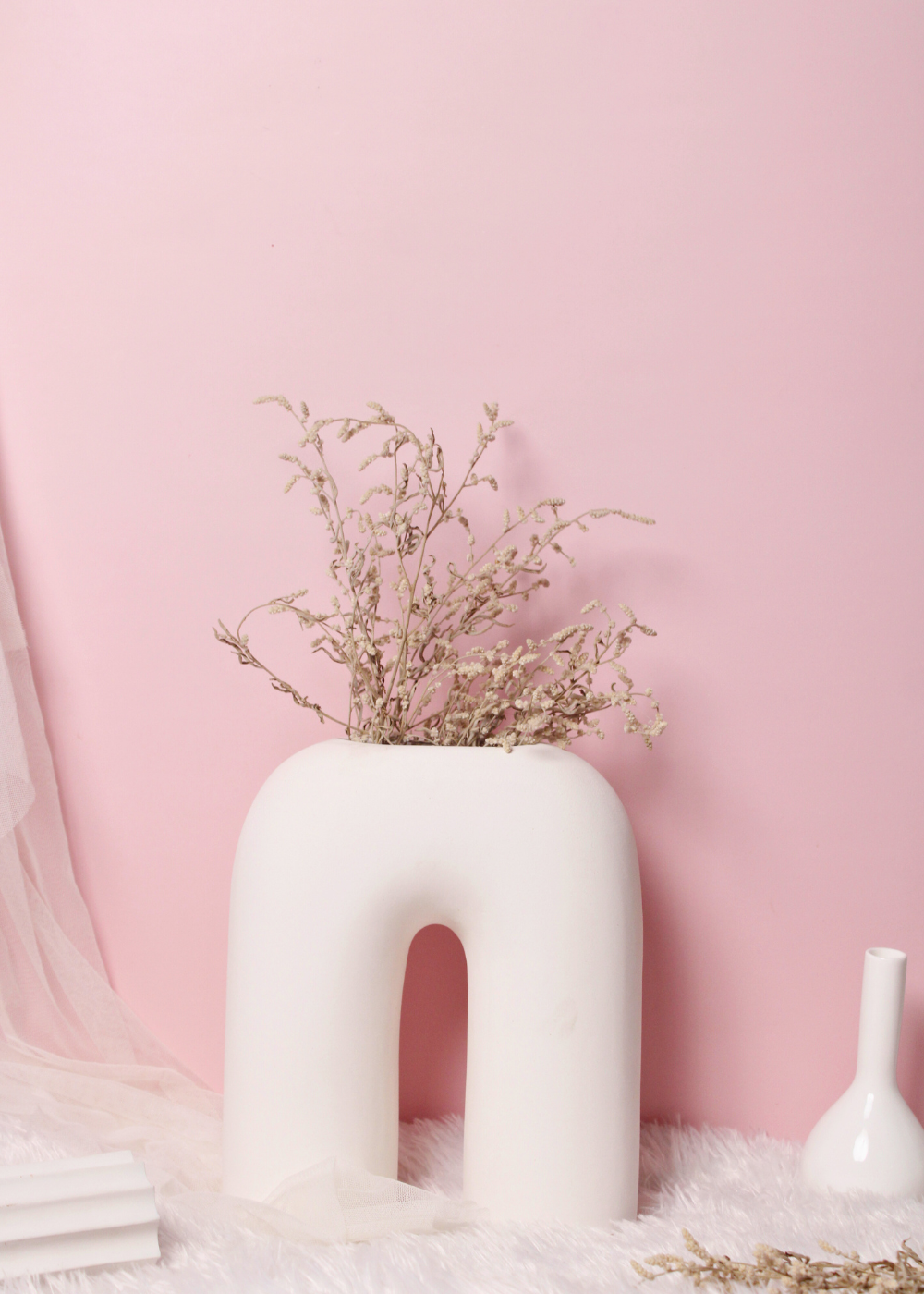 handmade white leg vase made by ceramic 