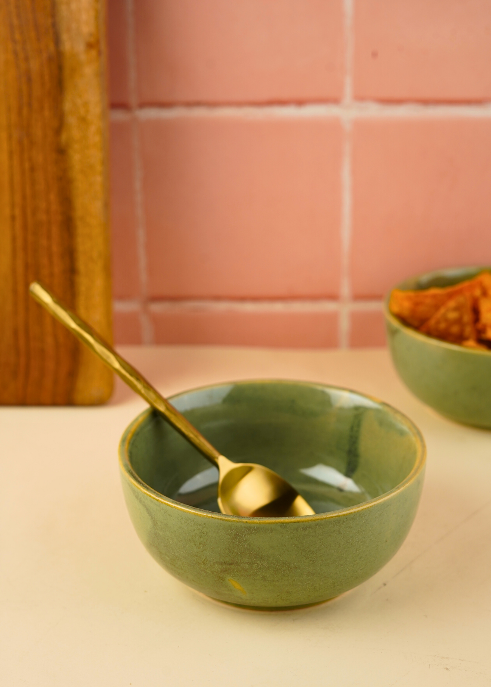 pistachio stoneware bowl with dinner spoon