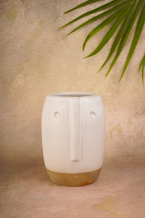 quirky face pot with face design