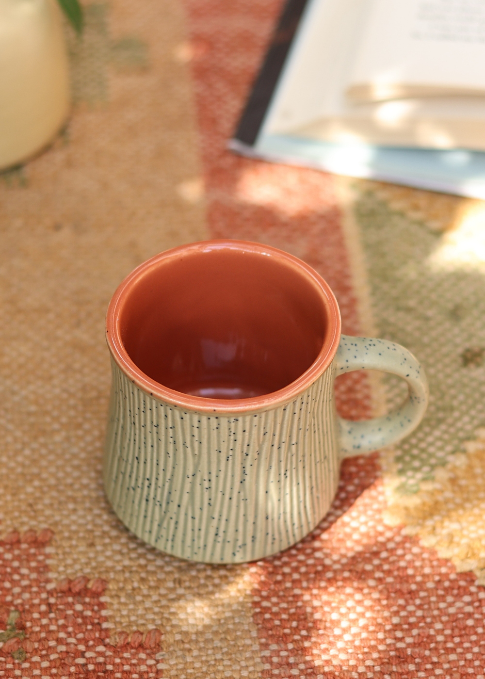 Top shot of olive etching cup 