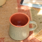 Top shot of olive etching cup 